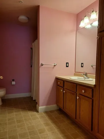 a bathroom with a toilet