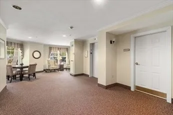 a kitchen with a sink cabinets and stainless steel appliances
