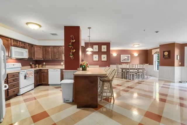 a view of a livingroom with furniture and window