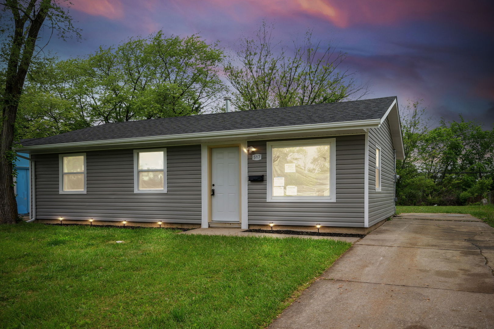 Undisclosed Address Chicago Heights, IL 60411 - Photo 20 of 20 a front view of a house with a yard