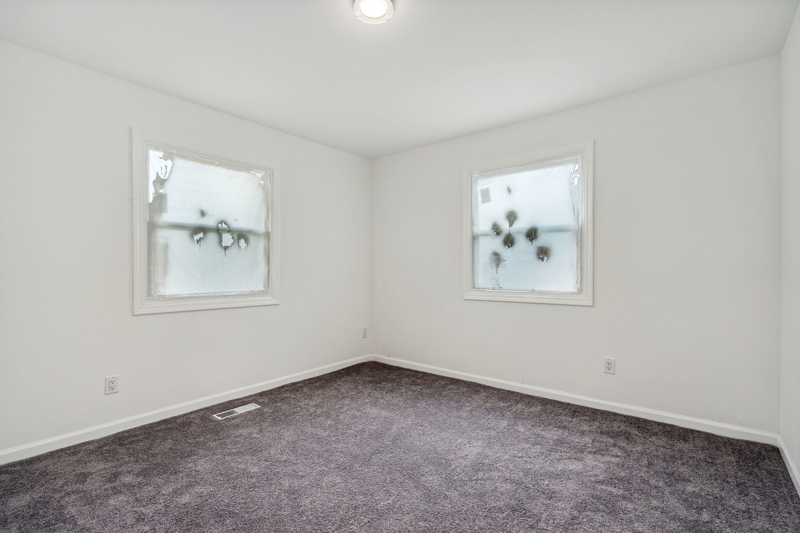 Undisclosed Address Chicago Heights, IL 60411 - Photo 5 of 20 an empty room with windows and closet