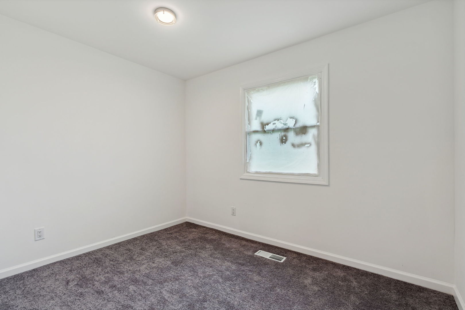 Undisclosed Address Chicago Heights, IL 60411 - Photo 6 of 20 an empty room with windows and bathroom