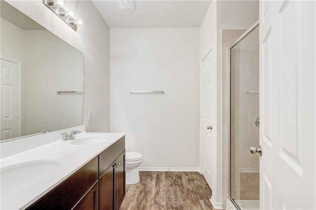 412 Ibis Falls Loop Jarrell, TX 76537 - Photo 14 of 29 primary bathroom with dual vanity