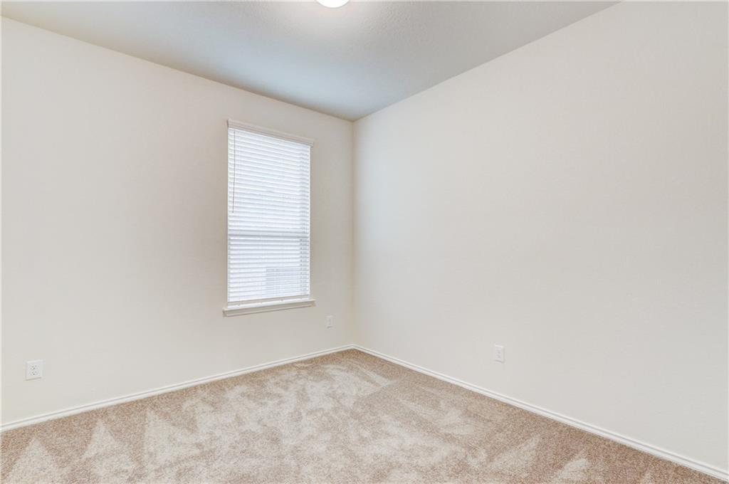 412 Ibis Falls Loop Jarrell, TX 76537 - Photo 19 of 28 an empty room with a window