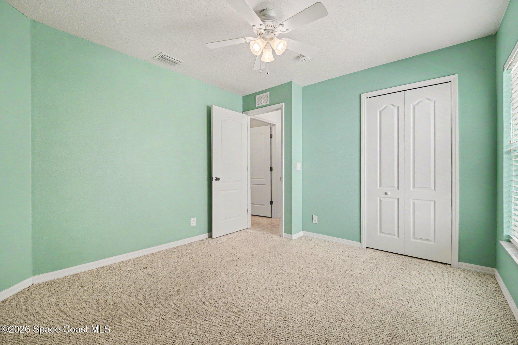 2194 Spring Creek Circle Palm Bay, FL 32905 - Photo 19 of 40 Back Guest Bedroom