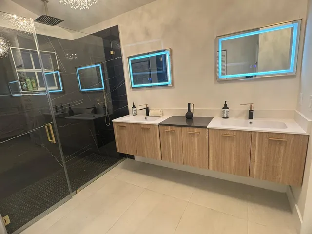 a bathroom with a sink and mirror