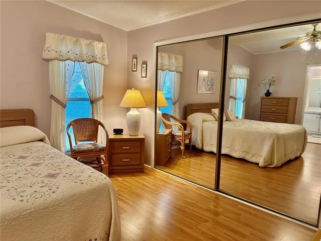 a bathroom with a sink a mirror and a shower