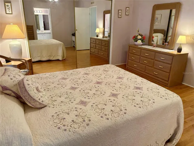 a bathroom with a shower curtain and a sink