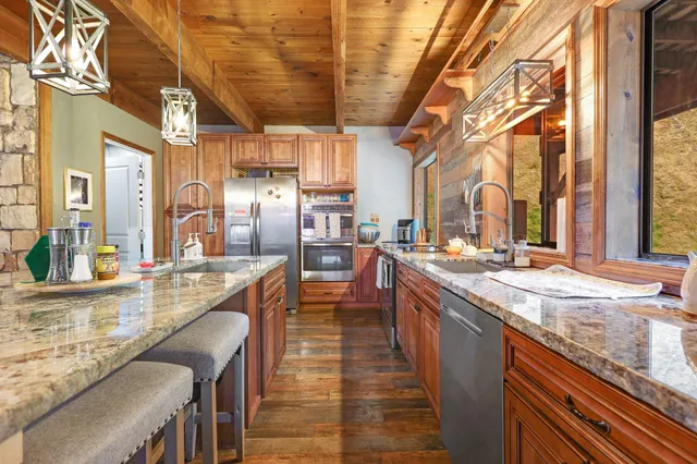a view of a storage and utility room with a washer dryer