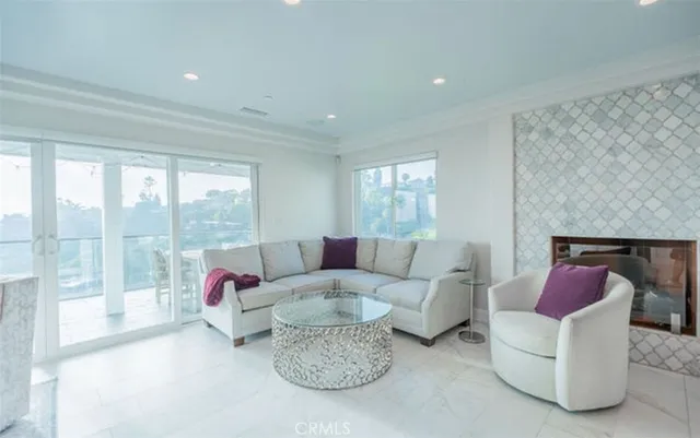 a living room with furniture and a rug