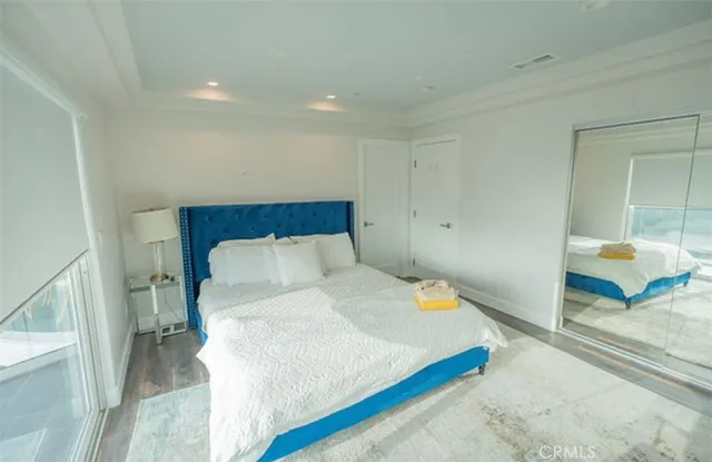 an aerial view of a house with outdoor space