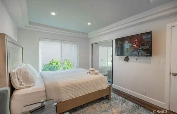 a view of a chairs and table in the balcony
