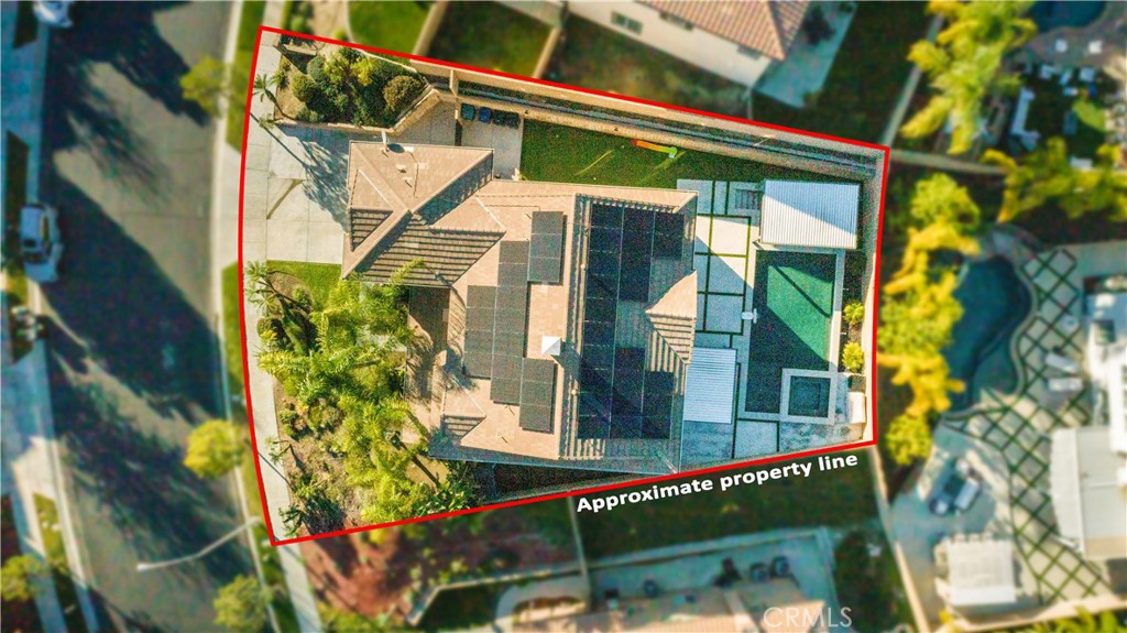 8824 Soothing Court Corona, CA 92883 - Photo 44 of 50 a front view of a house with a yard