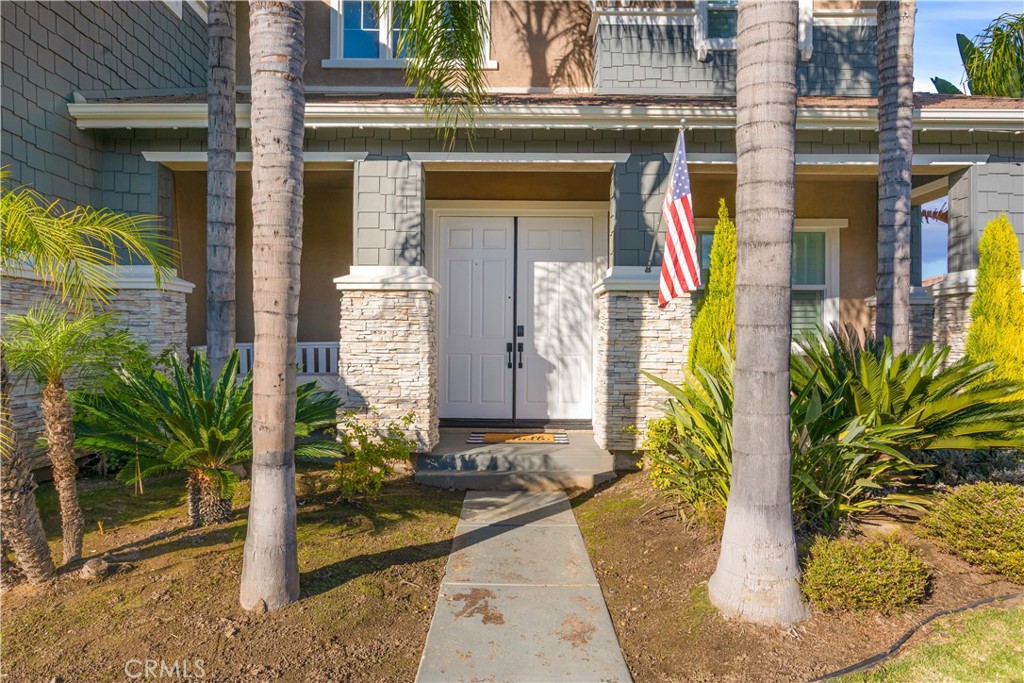 8824 Soothing Court Corona, CA 92883 - Photo 6 of 50 a front view of a house with outdoor