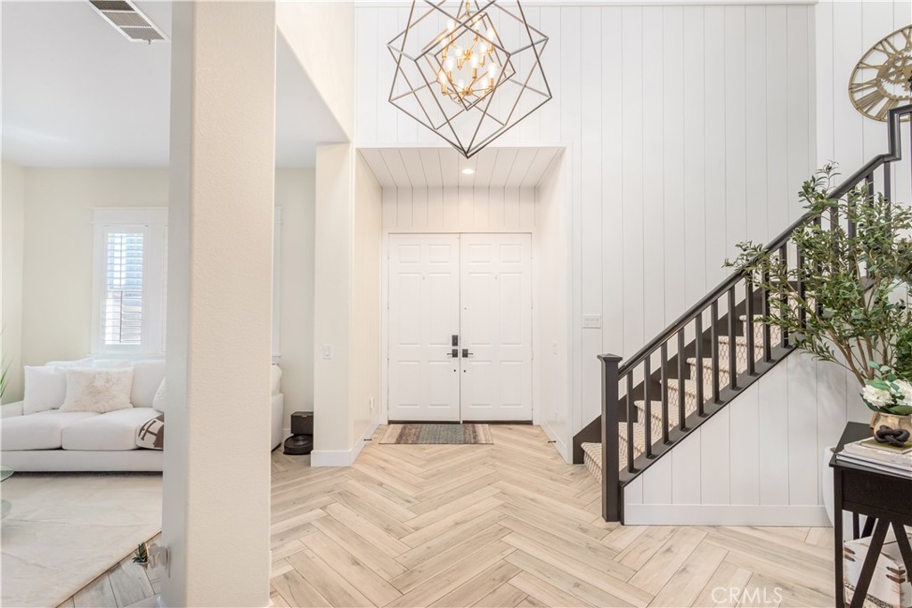 8824 Soothing Court Corona, CA 92883 - Photo 9 of 50 a view of an entryway with wooden floor
