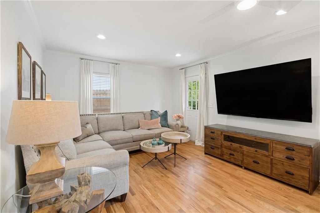 1493 Runnymeade Road Northeast Brookhaven, GA 30319 - Photo 19 of 40 a living room with furniture and a flat screen tv