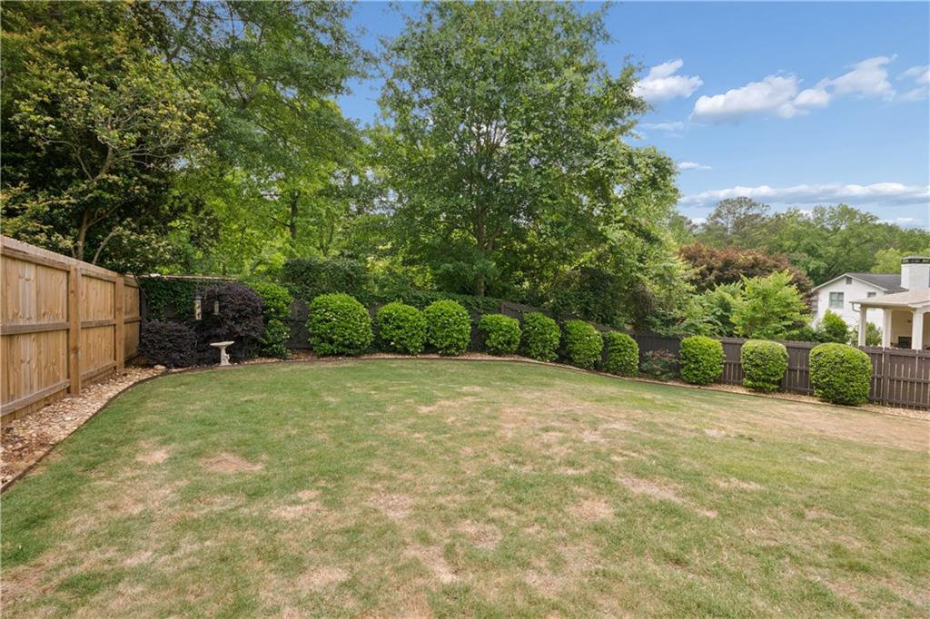 1493 Runnymeade Road Northeast Brookhaven, GA 30319 - Photo 36 of 40 a view of a backyard