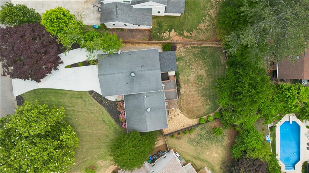 1493 Runnymeade Road Northeast Brookhaven, GA 30319 - Photo 38 of 40 an aerial view of a house with yard