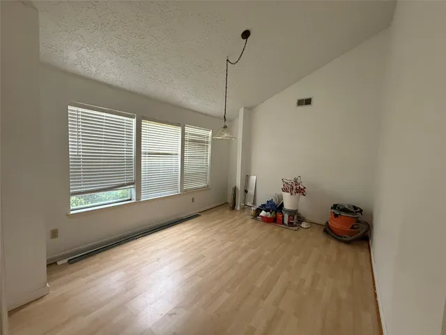 a room with window and ample daylight