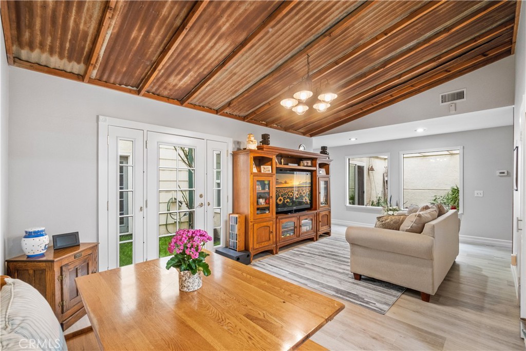 2671 Condor Circle Corona, CA 92882 - Photo 16 of 44 a living room with furniture and wooden floor
