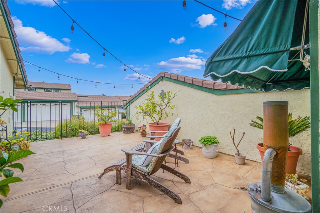 2671 Condor Circle Corona, CA 92882 - Photo 2 of 44 a view of a patio with table and chairs