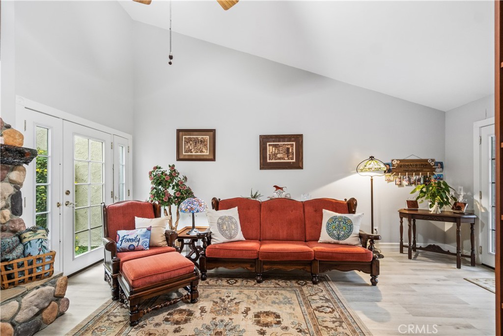 2671 Condor Circle Corona, CA 92882 - Photo 24 of 44 a living room with furniture and wooden floor