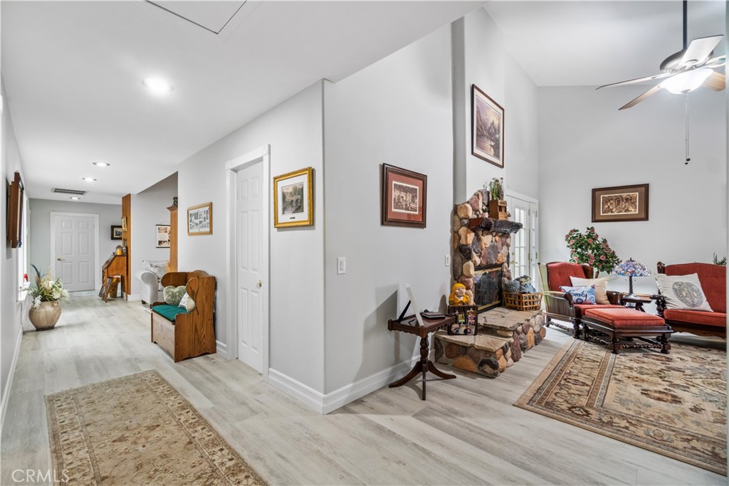 2671 Condor Circle Corona, CA 92882 - Photo 27 of 44 a living room with furniture and wooden floor