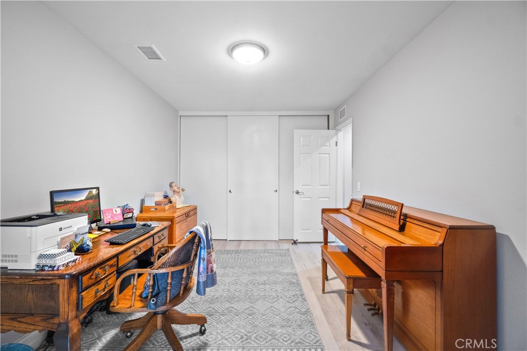 2671 Condor Circle Corona, CA 92882 - Photo 29 of 44 a room with furniture and musical instruments