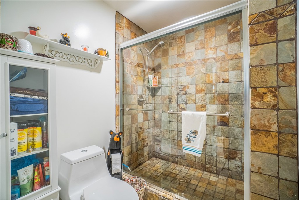 2671 Condor Circle Corona, CA 92882 - Photo 35 of 44 a bathroom with a toilet and a shower