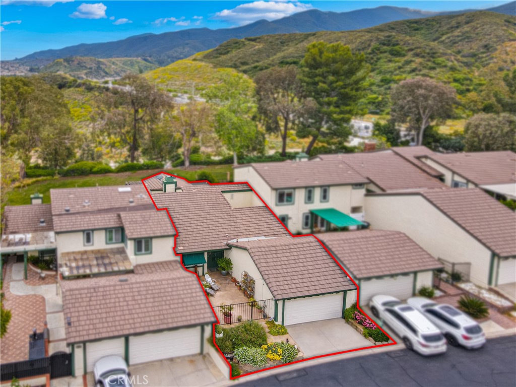 2671 Condor Circle Corona, CA 92882 - Photo 43 of 44 an aerial view of residential houses with outdoor space and trees