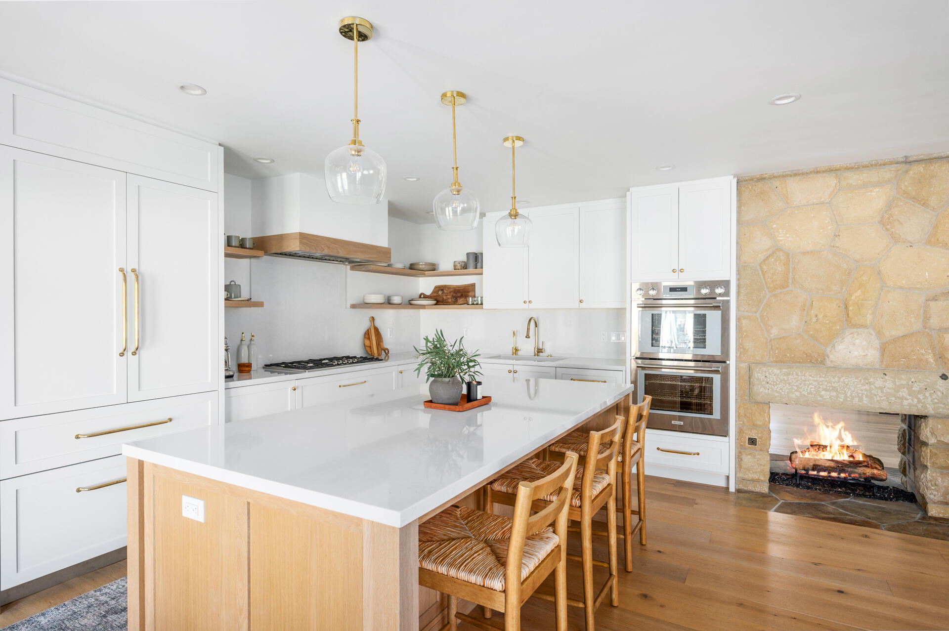 654 Chalk Hill Road Solvang, CA 93463 - Photo 11 of 30 a kitchen with stainless steel appliances stove refrigerator and wooden floor