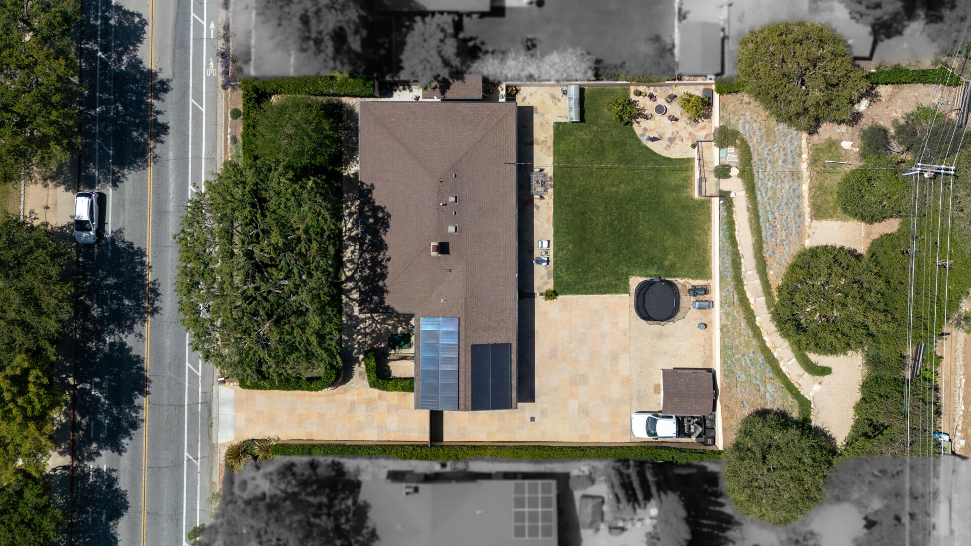 654 Chalk Hill Road Solvang, CA 93463 - Photo 30 of 30 an aerial view of a house with swimming pool and large trees