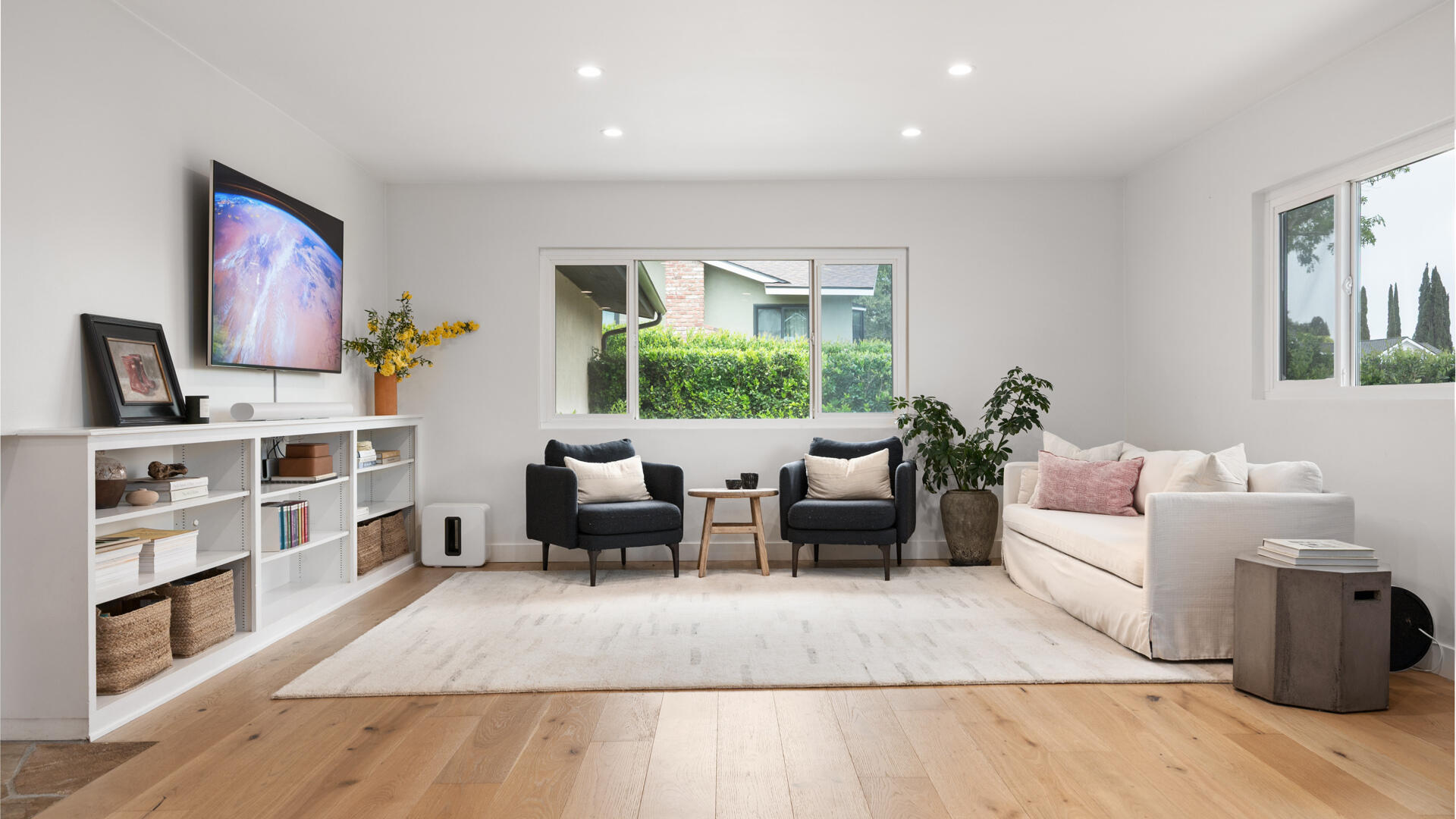 654 Chalk Hill Road Solvang, CA 93463 - Photo 6 of 30 a living room with furniture and a book shelf