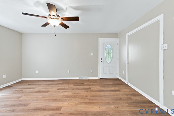 865 Sulphur Spring Road Prospect, VA 23960 - Photo 9 of 40 Spacious living area featuring wood-finish floorin