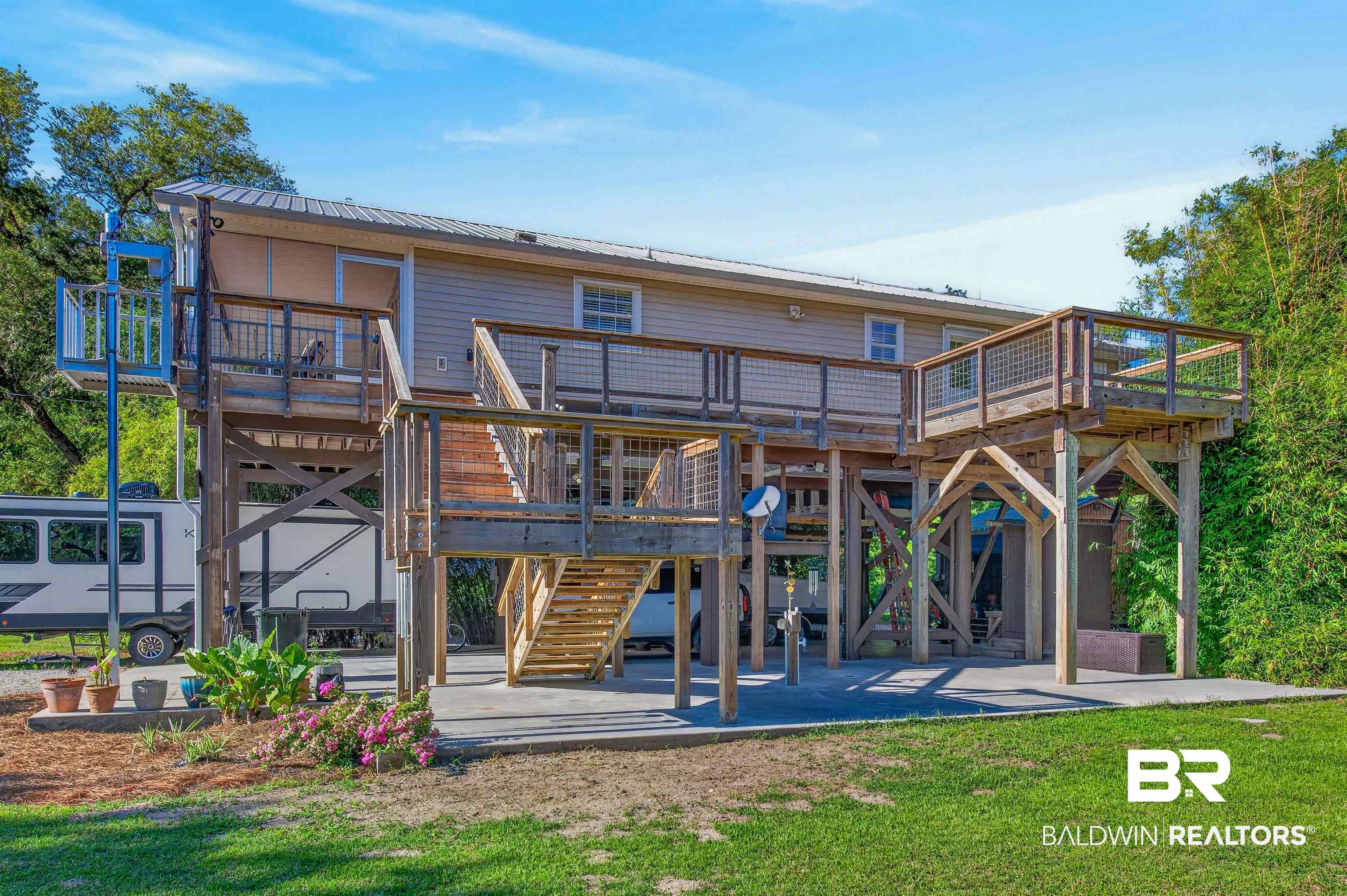 9624 North Bay Street Foley, AL 36535 - Photo 44 of 59 Elevated residence featuring a metal roof and horizontal siding