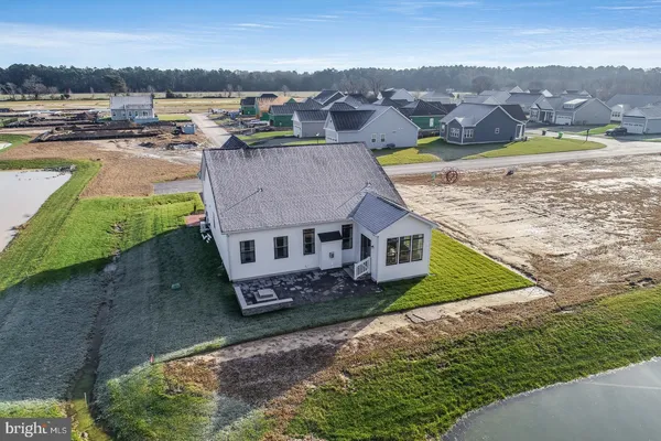 a aerial view of a house with garden