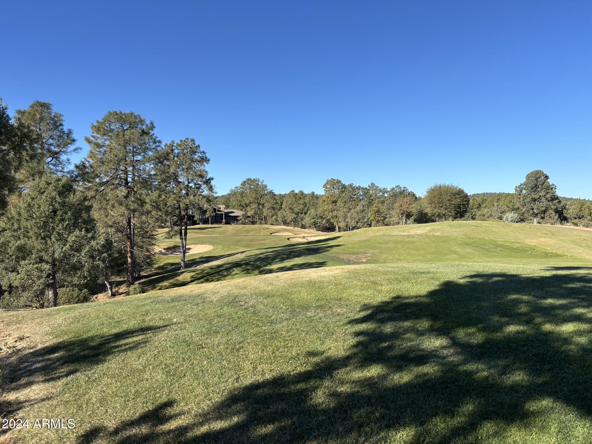2502 East Rim Club Drive, Unit 118 Payson, AZ 85541 - Photo 12 of 17 a view of an ocean from a yard