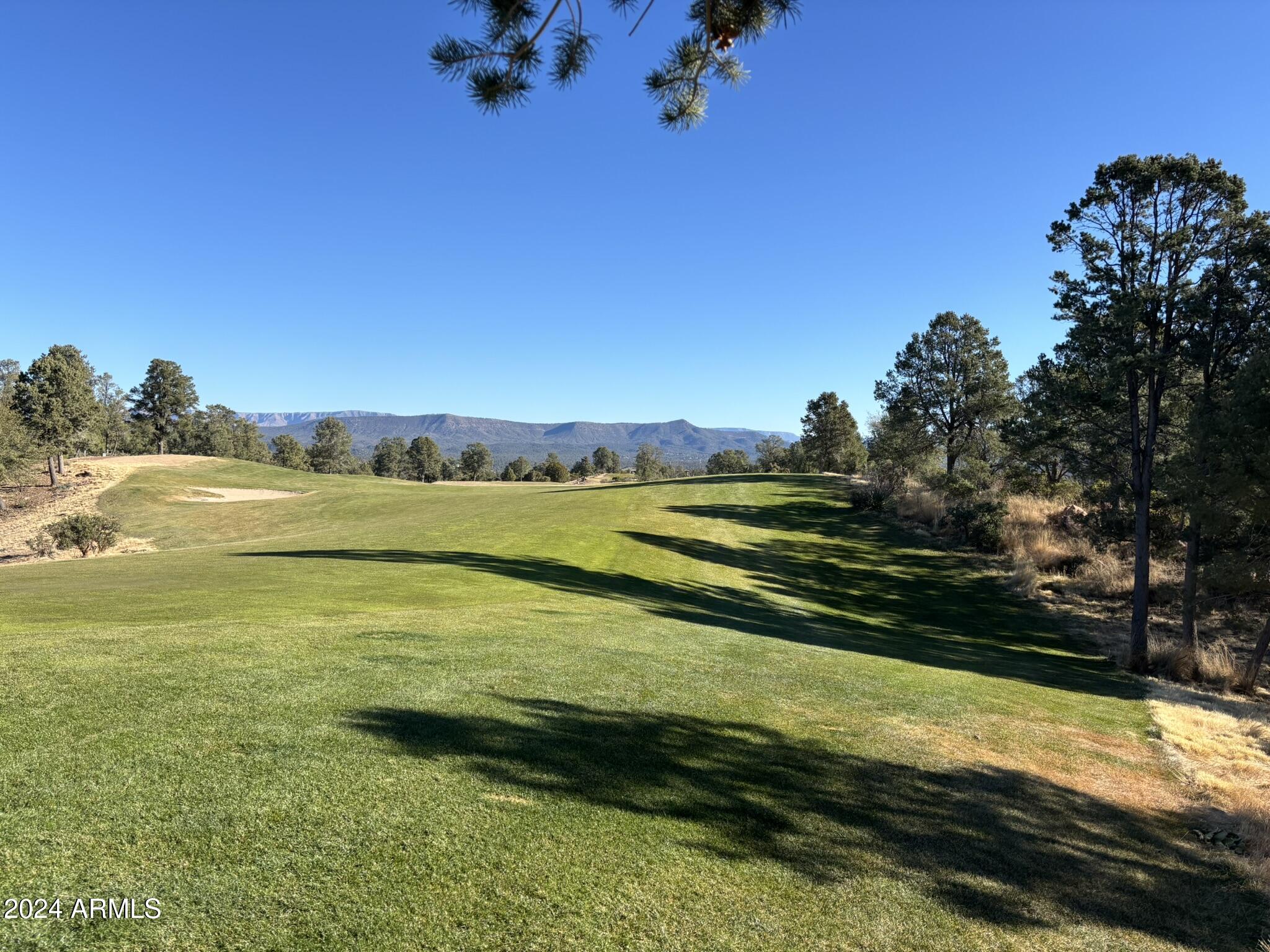 2502 East Rim Club Drive, Unit 118 Payson, AZ 85541 - Photo 6 of 17 a view of an ocean and beach