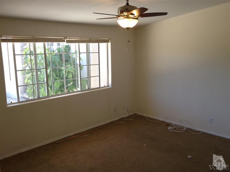 3230 Madera Place Oxnard, CA 93033 - Photo 5 of 9 an empty room with a window