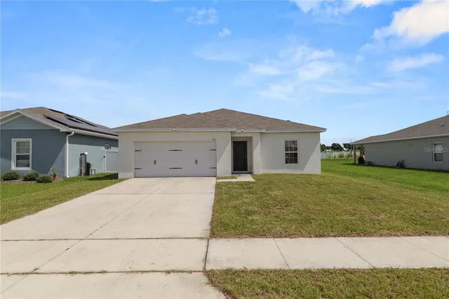 a house view with a garden space