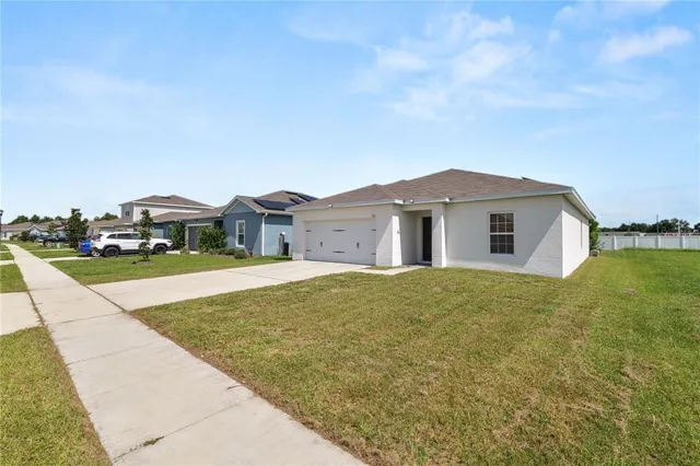 a house view with a garden space