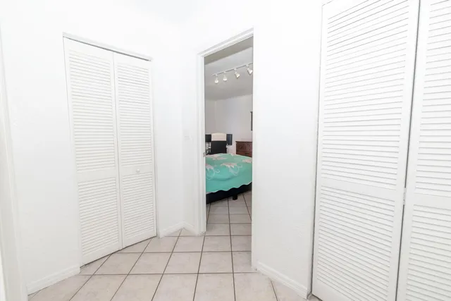 a view of a room with windows