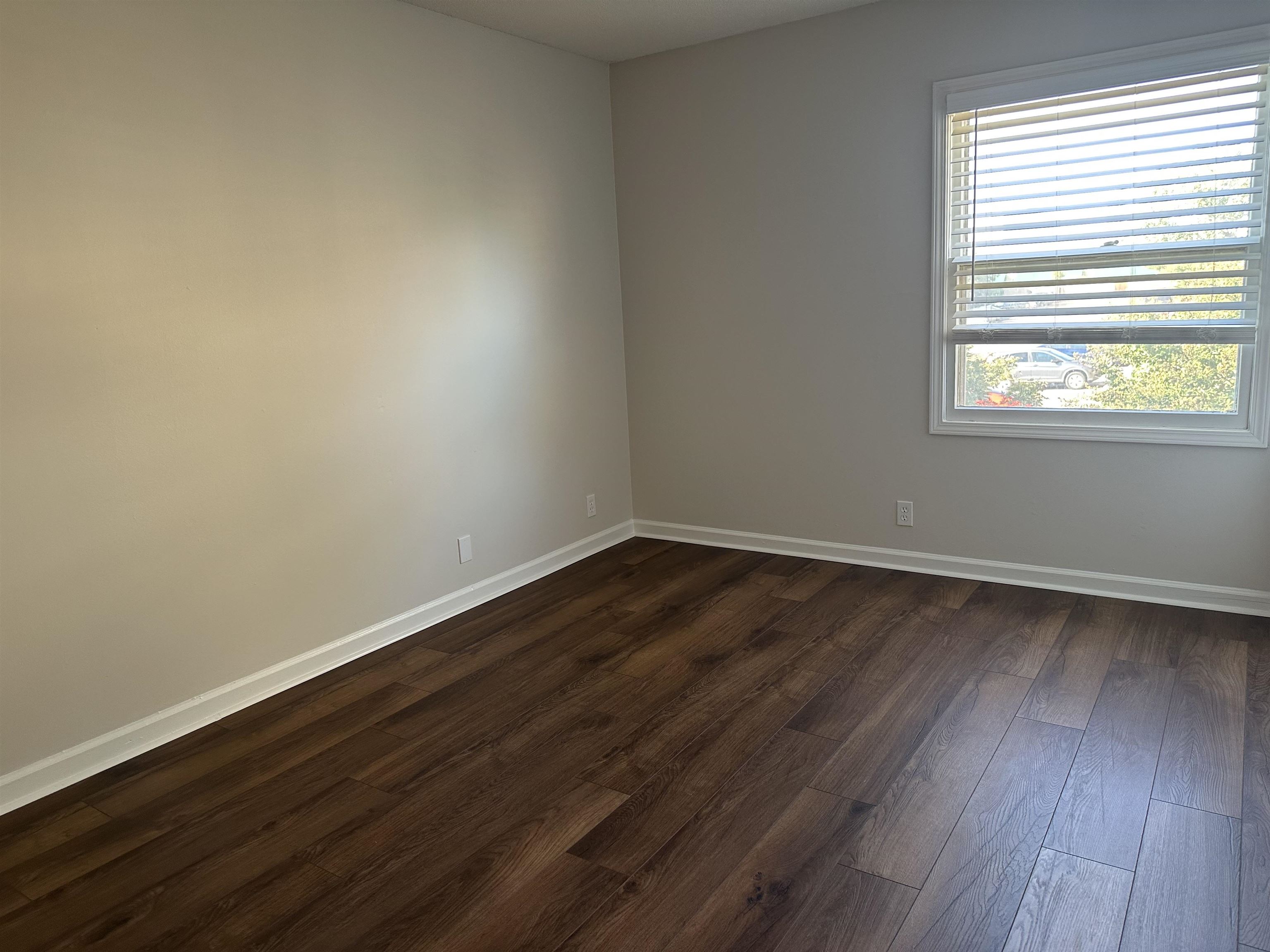 1214 Bristol Drive, Unit 1214 Memphis, TN 38119 - Photo 11 of 11 wooden floor in an empty room