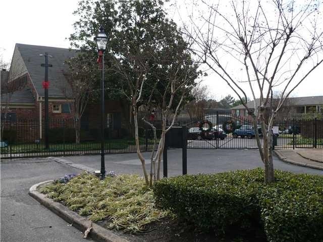 1214 Bristol Drive, Unit 1214 Memphis, TN 38119 - Photo 2 of 11 a view of a park with large trees