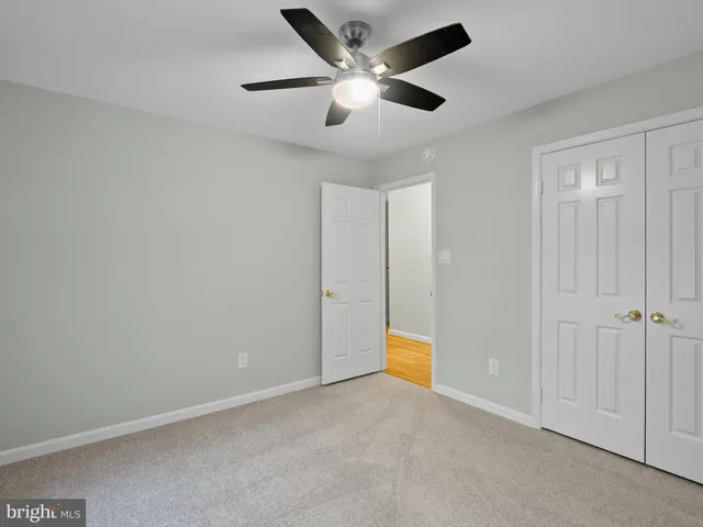 a bathroom with a sink vanity and a mirror