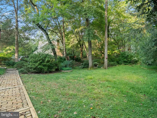 a view of front a house with a yard