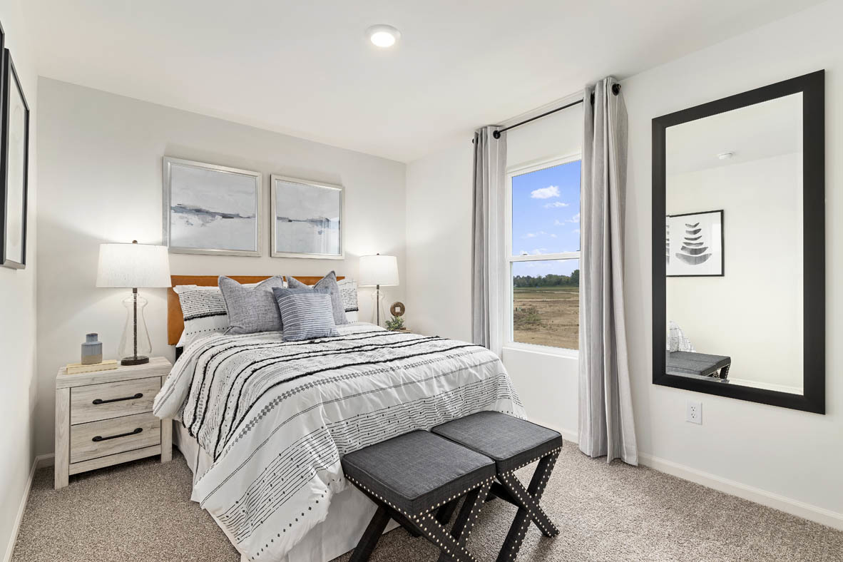 2121 Sassafras Way, Unit E Wonder Lake, IL 60097 - Photo 23 of 51 a bedroom with a bed and a window