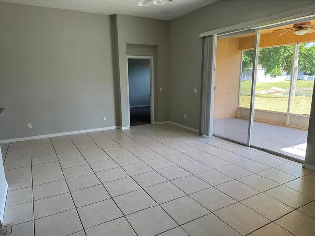 an empty room with sliding door