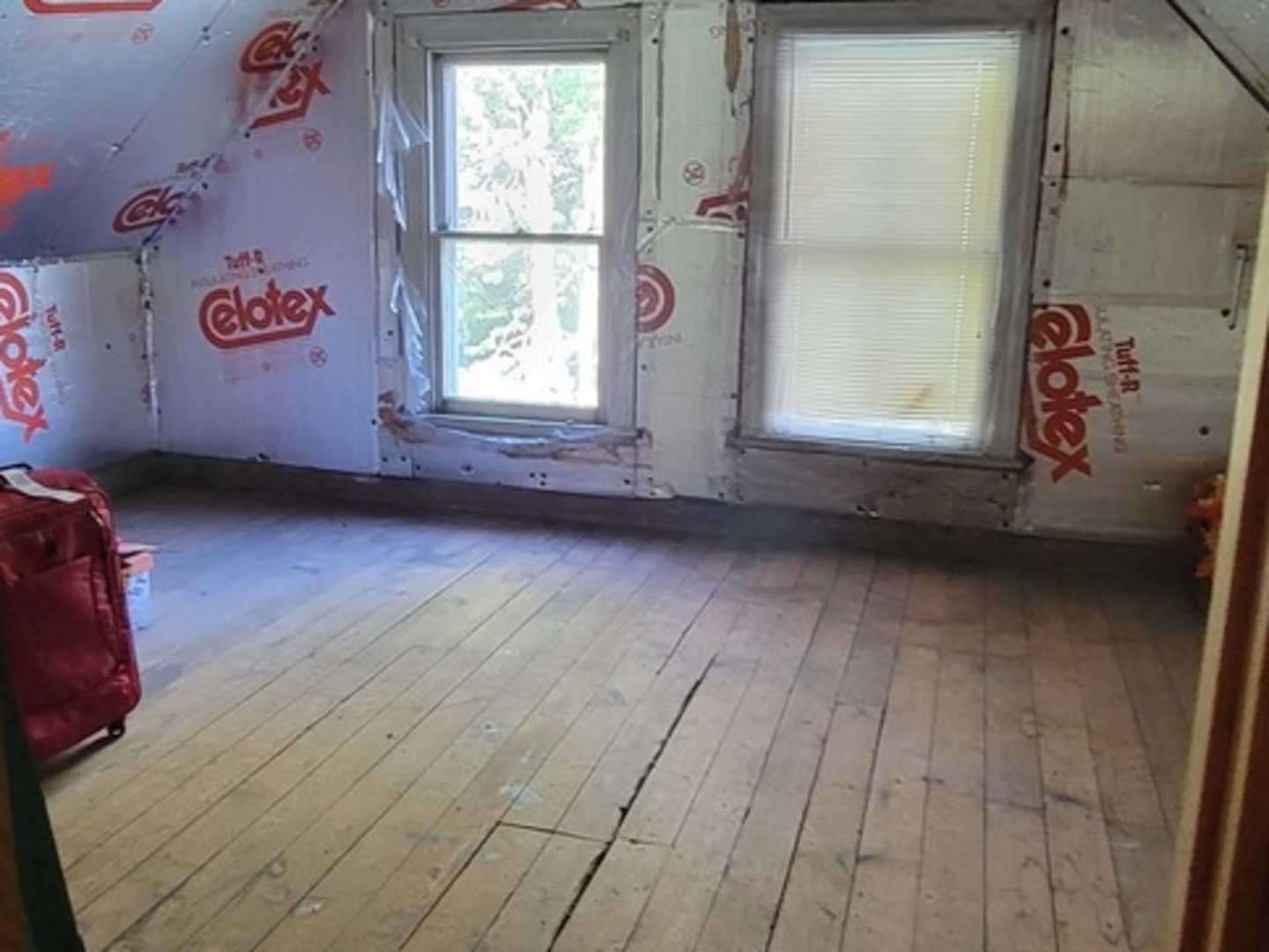 103 North Maple Street Momence, IL 60954 - Photo 36 of 43 a view of a livingroom with an empty space and a window