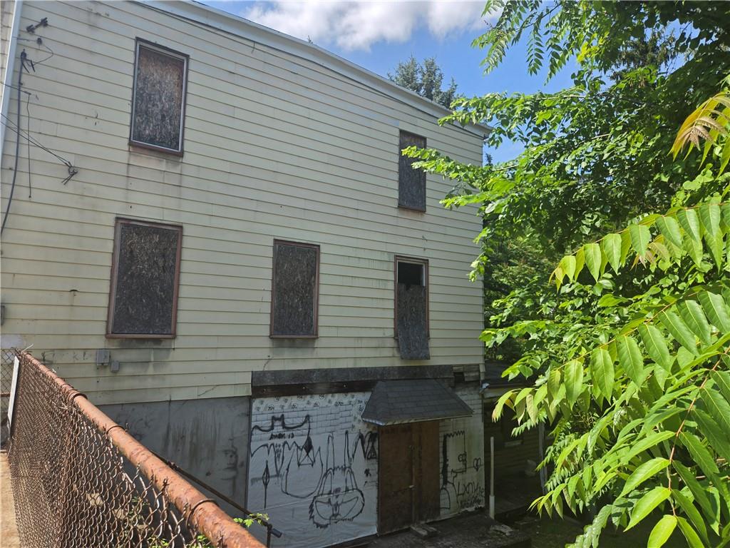 1922 Rhine Street Pittsburgh, PA 15212 - Photo 21 of 32 a front view of a house with plants